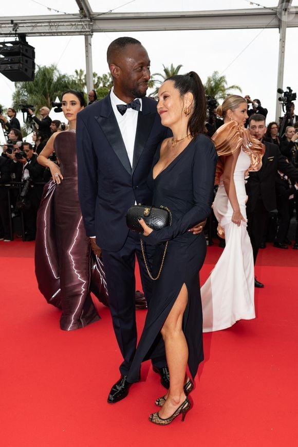 Thomas Ngijol et sa femme Karole Rocher - Montée des marches du film « Highest 2 Lowest  » lors du 78ème Festival International du Film de Cannes, au Palais des Festivals à Cannes. Le 19 mai 2025
© Olivier Borde/ Bestimage