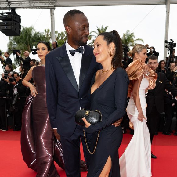 Thomas Ngijol et sa femme Karole Rocher - Montée des marches du film « Highest 2 Lowest  » lors du 78ème Festival International du Film de Cannes, au Palais des Festivals à Cannes. Le 19 mai 2025
© Olivier Borde/ Bestimage