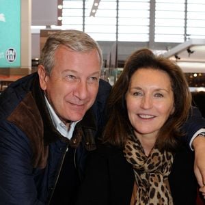 Cecilia Attias aux côtés de son mari Richard Attias signe des exemplaires de son livre lors du 34e Salon du Livre de Paris qui s'est tenu au Parc des Expositions, Porte de Versailles à Paris, France, le 23 mars 2014. Photo by Alban Wyters/ABACAPRESS.COM
