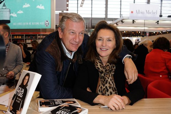 Cecilia Attias aux côtés de son mari Richard Attias signe des exemplaires de son livre lors du 34e Salon du Livre de Paris qui s'est tenu au Parc des Expositions, Porte de Versailles à Paris, France, le 23 mars 2014. Photo by Alban Wyters/ABACAPRESS.COM