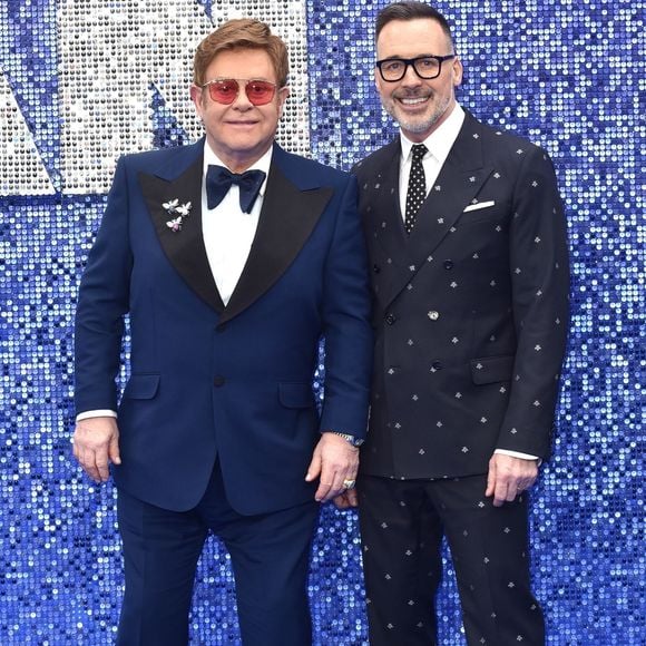 Sir Elton John, son mari David Furnish à la première du film "Rocketman" au cinéma Odeon Leicester Square à Londres, Royaume Uni, le 20 mai 2019. 

Backgrid UK/ Bestimage