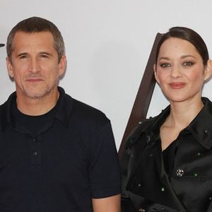 Marion Cotillard et Guillaume Canet se sont retrouvés à Paris pour l'avant-première du film Karma.

Guillaume Canet (réalisateur du film "Karma") et Marion Cotillard au photocall de la première du film "Karma" au cinéma Pathé Palace à Paris.

© Coadic Guirec / Bestimage