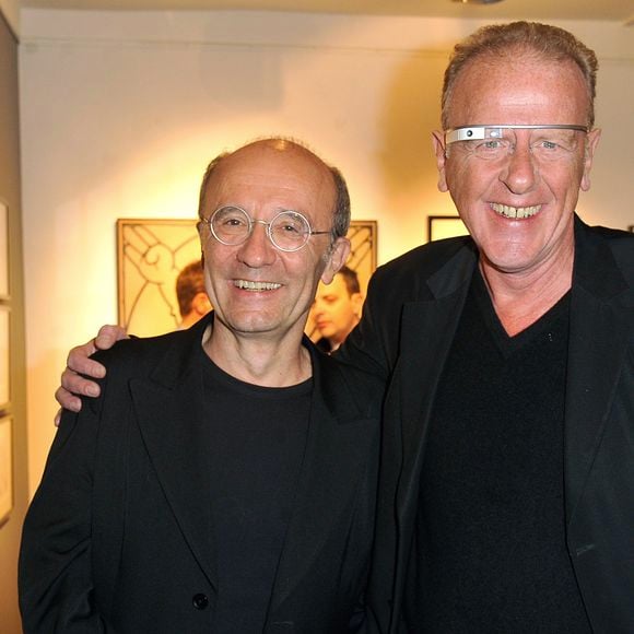 Jean Teulé et Philippe Geluck - Vernissage de l'exposition "Tout L'Art Du Chat" de Philippe Geluck à la galerie Huberty-Breyne à Paris, le 14 octobre 2014.