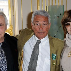 Jean-Marie Perier (ici avec Michel Sardou) reçoit la médaille d'Officier Dans L'Ordre National Des Arts Et Lettres des mains du ministre français de la Culture Frédéric Mitterrand lors d'une cérémonie qui s'est tenue au siège du ministère de la Culture, à Paris, France, le 8 février 2012. Photo by ABACAPRESS.COM
