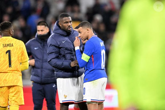 Marcus Thuram avec Kylian Mbappé (france) - Football - Match amical entre la France et l'Allemagne (0-2) au Groupama Stadium de Lyon-Décines le 23 mars 2024.
© Frederic Chambert / Panoramic / Bestimage