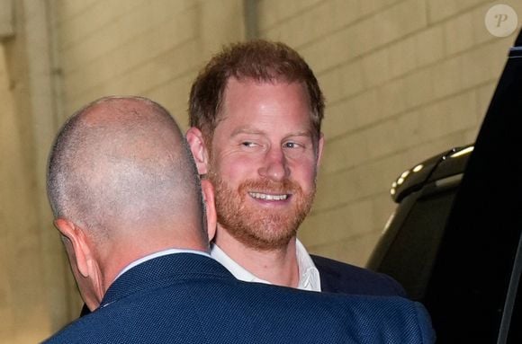 12/04/2024 EXCLUSIVE: Prince Harry spotted exiting The NY Times DealBook event in New York City. The British royal flashed a big smile as he attends solo while Meghan Markle is slated to attend an event on the west coast.