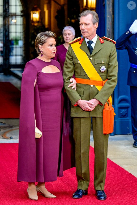 Le Grand-Duc Henri et la Grande-Duchesse Maria Teresa arrivent au Palais grand-ducal pour la cérémonie d'abdication du Grand-Duc Henri et l'accession de son fils le Grand-Duc héréditaire Guillaume au Palais grand-ducal et au bâtiment de la Chambre des députés à Luxembourg. Photo par Mischa Schoemaker/ABACAPRESS.COM