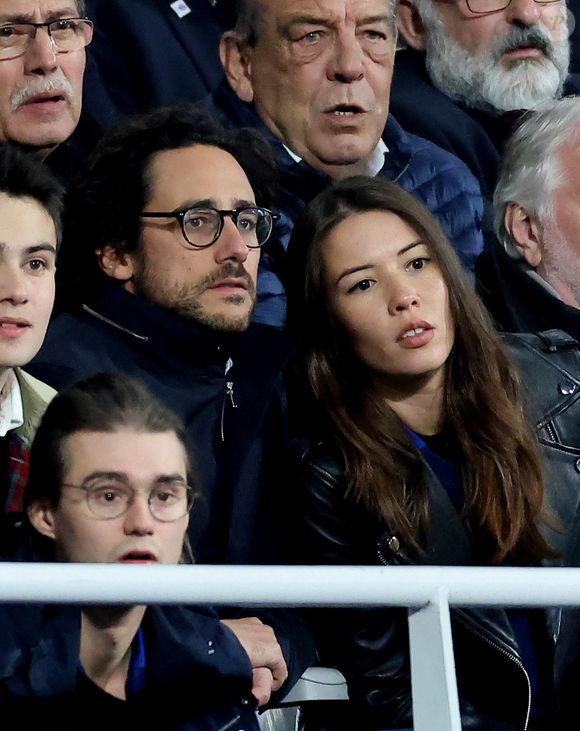 Thomas Hollande et sa femme Emilie Broussouloux - People des les tribunes de la coupe du Monde de Rugby France 2023 - Match de quart de finale "France-Afrique du Sud (28-29)" au Stade de France à Saint-Denis 15 octobre 2023. © Moreau-Jacovides/Bestimage