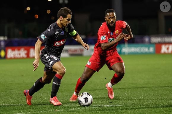 Nazon Duckens a partagé les étapes de son périple à la radio.

Wissam Ben Yedder (AS Monaco) vs Duckens Nazon (Quevilly-Rouen) - 16ème de finale de la Coupe de France "Quevilly Rouen - AS Monaco (1-3)" au stade Robert Diochon, le 2 janvier 2022.