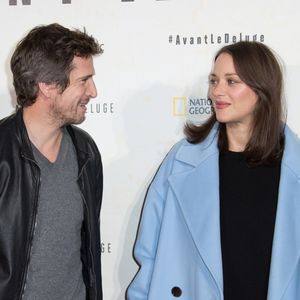 Marion Cotillard enceinte et Guillaume Canet - Avant première du documentaire "Before the flood" au théâtre du Chatelet à Paris le 17 octobre 2016. 

© Cyril Moreau/Bestimage