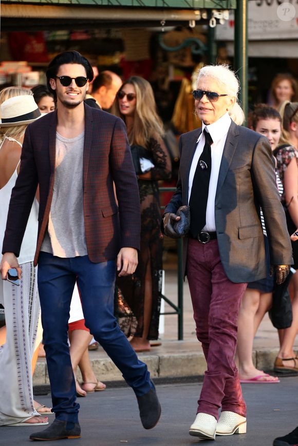 Baptiste Giabiconi et Karl Lagerfeld profitent d'une journée de shopping à Saint-Tropez, France le 4 août 2015. Photo ABACAPRESS.COM