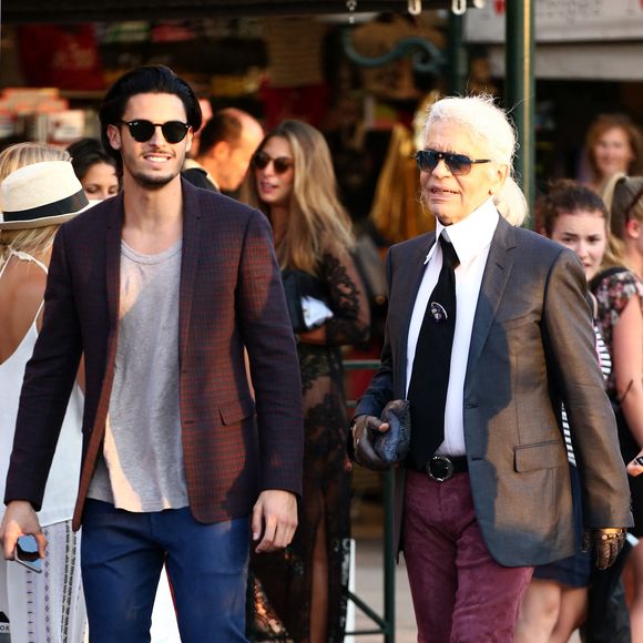 Baptiste Giabiconi et Karl Lagerfeld profitent d'une journée de shopping à Saint-Tropez, France le 4 août 2015. Photo ABACAPRESS.COM