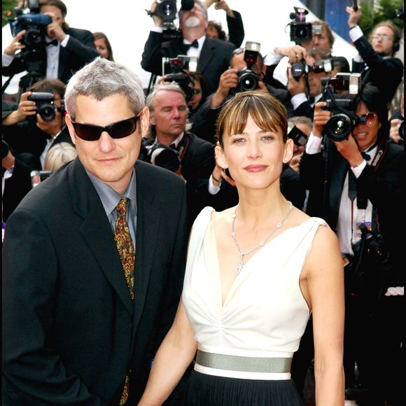 Sophie Marceau et Jim Lemley lors de la montée des marches du film "Where the truth lies" au 58e Festival du film de Cannes en 2005, France. Crédit Rachid Bellak / Bestimage