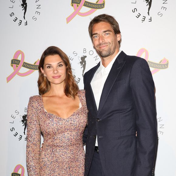 Une nouvelle certainement rassurante pour Camille Lacourt, à ses côtés tout au long de cette nouvelle épreuve

Camille Lacourt et sa compagne Alice Detollenaere (Miss Bourgogne 2010) - Photocall du 4ème gala de charité de l'association "Les Bonnes Fées" à l'occasion de la campagne mondiale "Octobre Rose" à l'hôtel Peninsula, Paris le 5 octobre 2023. © Coadic Guirec/Bestimage