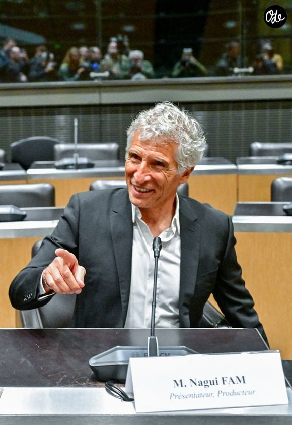 Le présentateur de télévision et producteur audiovisuel Nagui assiste à une audition de la Commission d'enquête parlementaire sur la neutralité, le fonctionnement et le financement du service public de radiodiffusion français à l'Assemblée nationale, à Paris, en France, le 1er avril 2026. © Christian Liewig/Bestimage