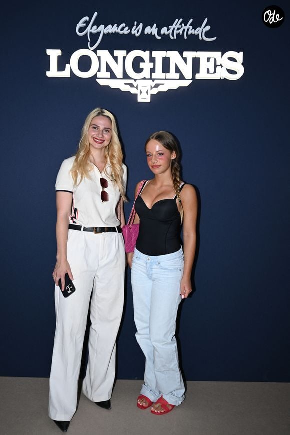 Nina Kopaeva et Guilia Sarkozy dans l'espace VIP, le Pavillon Eiffel, lors de la 12ème édition Longines Paris Eiffel Jumping au pied de la Tour Eiffel sur le Champ-de-Mars à Paris, France, le 19 juin 2026. 

© Perusseau-Veeren/Bestimage