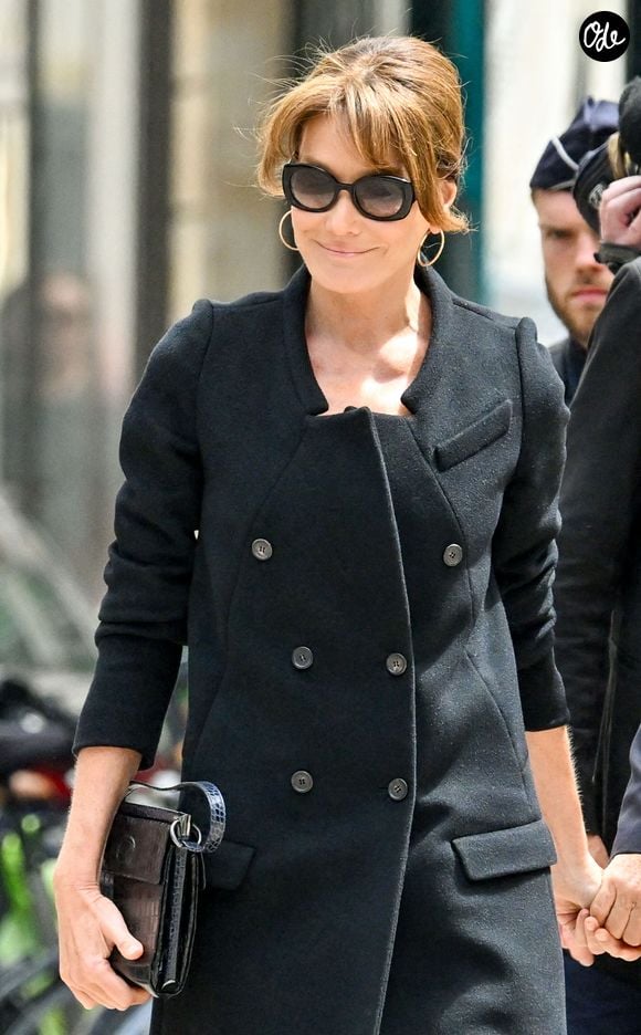 Carla Bruni et son mari Nicolas Sarkozy aux obsèques de B.Chirac en la basilique Sainte-Clotilde à Paris (7ème) le 12 juin 2026. L’ancienne première dame de France est décédée le 5 juin 2026 à l’âge de 93 ans. 
© Jacovides / Liewig / Bestimage