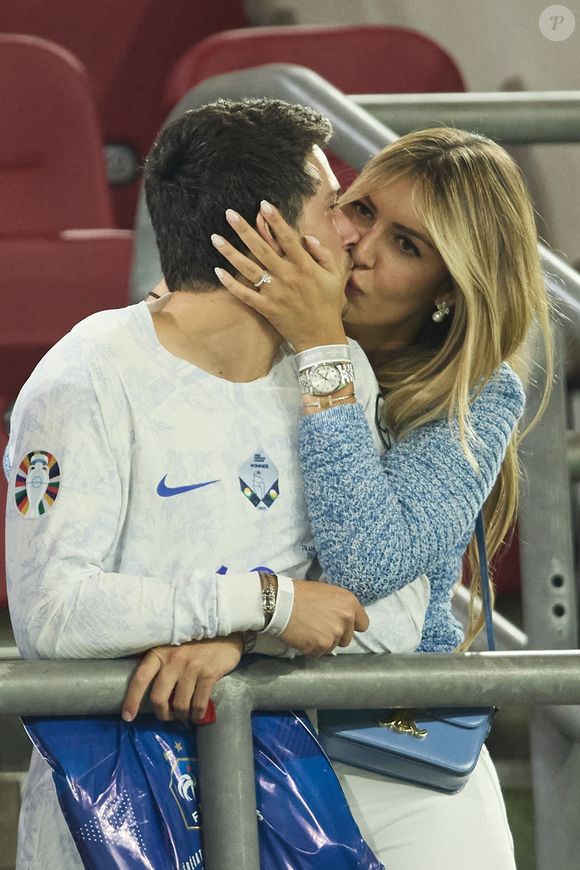 Dylan Deschamps et sa compagne Mathilde Cappelaere - Célébrités dans les tribunes du match du groupe D de l'Euro 2024 entre l'équipe de France face à l'Autriche (1-0) à Dusseldorf en Allemagne le 17 juin 2024. © Cyril Moreau/Bestimage