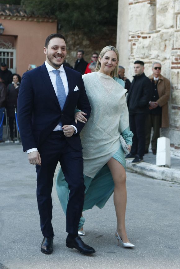 La princesse Theodora de Grèce et son mari Matthew Kumar lors du mariage du prince Nikolaos de Grèce et de Chrysi Vardinogiannis à l'église Saint Nicolas Ragavas à Athènes, le 7 février 2025. Photo by Sotiris Dimitropoulos/Eurokinissi/ABACAPRESS.COM