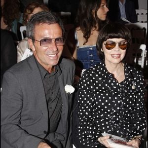 Olivier Echaudemaison a collaboré avec de grandes marques de l'univers de la beauté, comme Givenchy dans les années 90, avant de rejoindre la maison Guerlain en 2000 en tant que directeur de la création maquillage, un poste qu'il a occupé jusqu'en 2025. 

Mireille Mathieu et Olivier Echaudemaison au défilé de mode Christian Lacroix en 2007.

RINDOFF-BORDE / BESTIMAGE