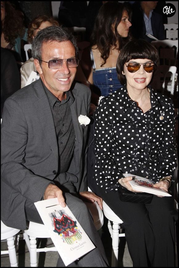 Olivier Echaudemaison a collaboré avec de grandes marques de l'univers de la beauté, comme Givenchy dans les années 90, avant de rejoindre la maison Guerlain en 2000 en tant que directeur de la création maquillage, un poste qu'il a occupé jusqu'en 2025. 

Mireille Mathieu et Olivier Echaudemaison au défilé de mode Christian Lacroix en 2007.

RINDOFF-BORDE / BESTIMAGE