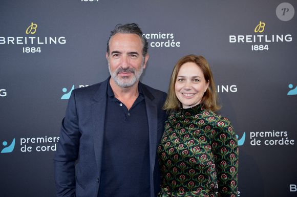 Jean Dujardin et Nathalie Péchalat (nouvelle présidente de l'association "Premiers de Cordée") - Dîner de charité Breitling à la Samaritaine pour l'association "Premiers de Cordée" à Paris le 4 avril 2024. L'association Premiers de Cordée propose des animations sportives auprès des enfants hospitalisés. ADN de l'association depuis sa création, ce programme comprend de nombreuses actions pour initier un maximum d'enfants malades et/ou en situation de handicap à la pratique sportive. © Rachid Bellak/Bestimage