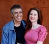 Amoureux d'Hélène Grémillon depuis plus de vingt ans, Julien Clerc a vécu avec elle une vie de bohème loin des strass et des paillettes.

Julien Clerc avec sa femme Hélène Grémillon au village (jour 14) lors des Internationaux de France de Tennis de Roland Garros 2022 à Paris, France. © Dominique Jacovides/Bestimage