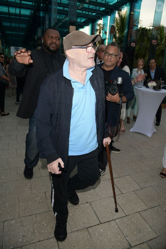Phil Collins inaugure la bijouterie "Orianne Collins" du nom de ex femme Orianne avec qui il est a nouveau en couple à Miami le 10 mai 2018.