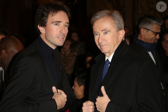 Antoine Arnault et son père Bernard Arnault assistant au défilé Berluti Menswear Fall/Winter 2019-2020 dans le cadre de la semaine de la mode à Paris qui s'est tenue à l'Opéra Garnier, en France, le 18 janvier 2019. Photo by Jerome Domine/ABACAPRESS.COM