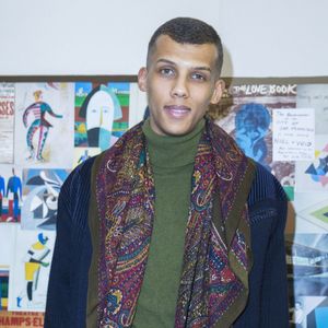 Le chanteur Stromae - People au défilé de mode hommes Valentino collection prêt-à-porter Automne Hiver à Paris.