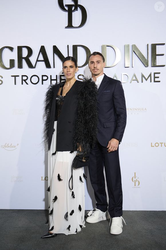 Juan Imhoff et Natacha Eguía - Première édition des Trophées Madame – Le Grand Dîner dans le cadre prestigieux de l'hôtel Peninsula à Paris le 6 mars 2025. Cet événement d’exception a réuni des figures influentes du monde de la culture, du sport, du luxe et de l’entrepreneuriat, venues célébrer les femmes qui façonnent et inspirent notre époque.
Placée sous le signe de l’excellence, de l’innovation et de l’audace, cette soirée a mis à l’honneur des personnalités féminines remarquables, sélectionnées pour leur impact et leur engagement dans leur domaine respectif.
Le trophée exclusif des « Trophées Madame » a été conçu par l’artiste de street art Leloluce, incarnant la force et la résilience des femmes d’aujourd’hui.
Les lauréates ont été choisies par un comité d’expertes influentes, issues du mouvement Women With Impact et reconnues pour leur discernement et leur engagement en faveur de la promotion des femmes. © Cyril Moreau/Bestimage
