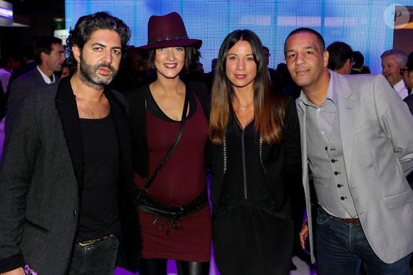 John Mamann, Sheryfa Luna (enceinte), Anne-Gaelle Riccio et Cartouche lors de la soirée d'inauguration des nouvelles Renault Espace et Clio lors du Salon de l'automobile au Parc des Expositions de la porte de Versailles à Paris.