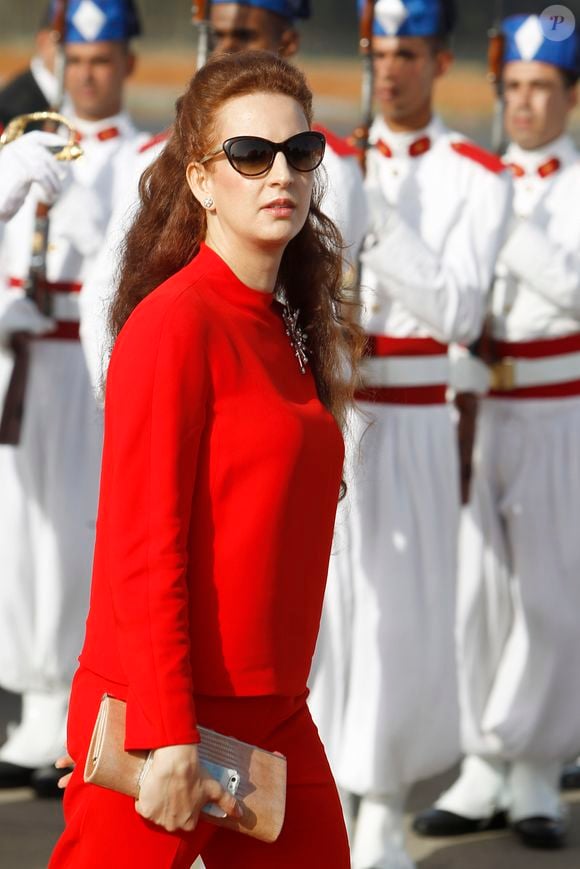 La princesse Lalla Salma à l'aéroport de Rabat, accompagnés du roi Mohammed VI du Maroc le 15 juillet 2014. Photo par GTRES / BESTIMAGE