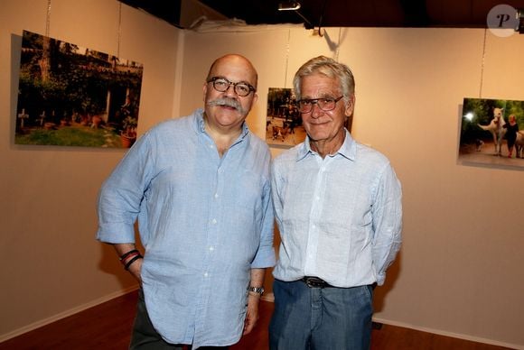 Gérard Schachmes et Bernard d'Ormale (mari de Brigitte Bardot) - Vernissage de l'exposition "Brigitte for Ever" du photographe Gérard Schachmes à Saint-Tropez le 25 juillet 2014. Gérard Schachmes expose ses plus belles photos de B.B. à la fois pour célébrer les 80 ans de Brigitte Bardot (le 28 septembre 2014) et la sortie d'un album de clichés inédits.
