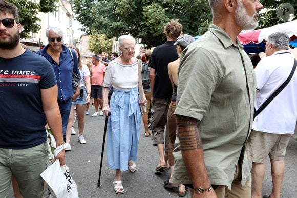 La reine Margrethe II de Danemark se rend comme tous les ans au marché de Cahors le 17 août 2024.
© Jean-Marc Lhomer / Bestimage