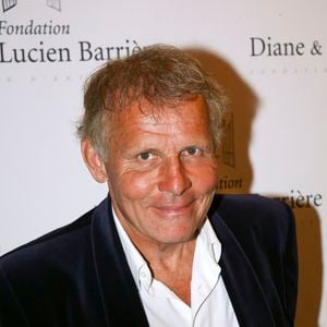 Il a ainsi renoncé au JT de TF1 en 2011 (ndlr : il avait été embauché sur l'idée de Patrick Poivre d’Arvor, habituellement remplacé par Thomas Hugues).
Portrait de Patrick Poivre d'Arvor en 2013 à la Fondation Barrière Paris JLPPA / Bestimage