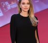 Elle insiste sur l’importance d’associer cette image à une information claire sur la santé mammaire et le dépistage du cancer du sein. 

Angelina Jolie assiste au tapis rouge du film 'Couture' lors du 20ème Festival du Film de Rome à l'Auditorium Parco della Musica à Rome (Italie), 18 octobre 2025. © Andrea Staccioli/Insidefoto via ZUMA Press/Bestimage