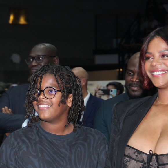 Eden Riner et sa mère Luthna Riner - Soirée de remerciement de Teddy Riner à la Maison du judo à Montrouge, le 29 novembre 2024. Devant une centaine d'invités, Le champion olympique (11 fois) et champion olympique (5 fois) a tenu à remercier tous ceux qui l'ont soutenu tout au long de son impressionnante carrière, de son premier entraîneur en club jusqu’à sa femme et sa mère, en passant par sa psychologue de l’INSEP. Une vente aux enchères au profit de l'association de Teddy Riner a conclu la soirée. 
© Philippe Baldini / Bestimage 
Merci de flouter le visage des enfants avant parution.