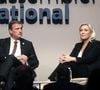 Marine Le Pen est invitée au journal de 20H de TF1 ce soir. Il faut dire que ce midi, la femme politique a été condamnée à cinq ans d'inéligibilité avec effet immédiat
Louis Alliot et Marine Le Pen - XVIIIe Congrès du Rassemblement National à la Mutualité à Paris.
© Stéphane Lemouton / Bestimage