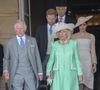 Désormais libérés de toute obligation royale, pour rien au monde les intéressés ne redeviendraient des membres actifs de la Firme Outre-Manche.

Camilla Parker Bowles, duchesse de Cornouailles, le prince Harry, duc de Sussex, et Meghan Markle, duchesse de Sussex, lors de la garden party pour les 70 ans du prince Charles au palais de Buckingham à Londres. Le 22 mai 2018 (Agence / Bestimage)