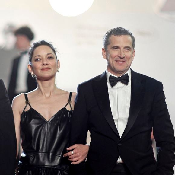 Marion Cotillard et Guillaume Canet - Descente des marches du film " Karma " lors du 79ème Festival International du Film de Cannes. © Jacovides-Moreau / Bestimage