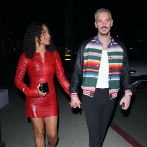 BGUK_2807586 – Los Angeles, Californie – Christina Milian est arrivée dîner dans une robe rouge à imprimé serpent, accompagnée de son mari Matt Pokora, au Catch Steak LA à West Hollywood. Backgrid UK / Bestimage.