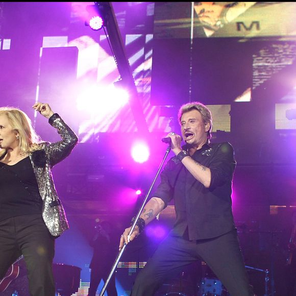 Sylvie Vartan et Johnny Hallyday lors de la tournée "Tour 66" au Stade de France. Photo par ANGELI-BORDE-JACOVIDES-RINDOFF / BESTIMAGE