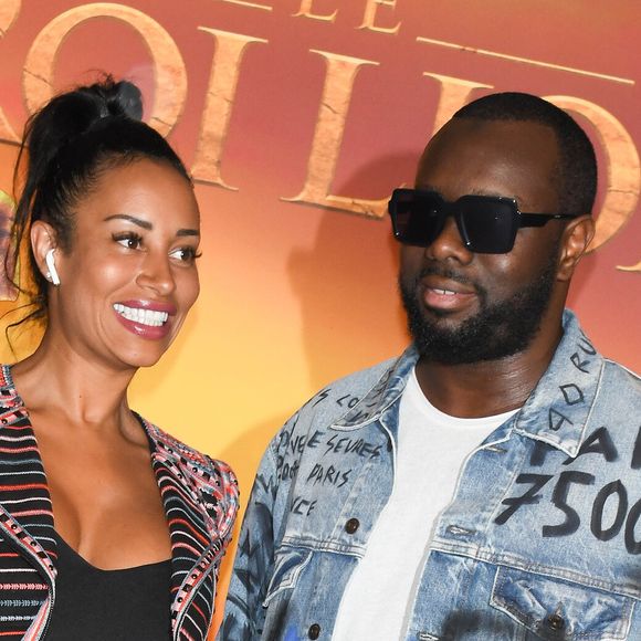 Ensuite, il s'agit de la télévision, et notamment de sa présence sur TF1 : "C’est clairement le nerf de la guerre pour un artiste".

Gims et sa femme Demdem Djuna à la projection exceptionnelle du nouveau Disney "Le Roi Lion" au Grand Rex à Paris le 11 juillet 2019.
