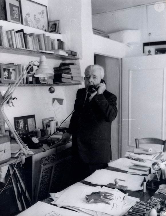 Jan 06, 1970 - Paris, France - JACQUES PREVERT parle au téléphone dans son bureau. (Image : Keystone Press Agency/ZUMA Press Wire)