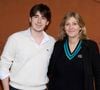 Oscar Bruel ne se limite plus à son héritage familial. Il a récemment publié son premier ouvrage, "La cité intérieure"

Amanda Sthers et son fils Oscar Bruel au village (night session) lors des Internationaux de France de tennis de Roland Garros 2024, à Paris, France, le 31 mai 2024. © Jacovides-Moreau/Bestimage