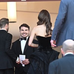 Antoine Dupont et Iris Mittenaere assistent au tapis rouge du "Dossier 137" (Case 137) lors de la troisième journée du 78ème Festival de Cannes au Palais des Festivals le 15 mai 2025 à Cannes, France. Photo by David Niviere/ABACAPRESS.COM