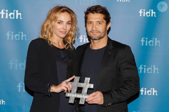Exclusif - Bixente Lizarazu et sa compagne Claire Keim - Soirée annuelle de la FIDH (Fédération Internationale des ligues de Droits de l'Homme) à l'Hôtel de Ville à Paris, le 8 décembre 2014.