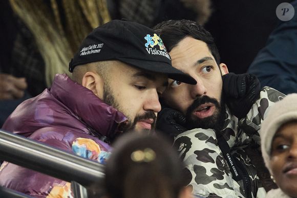 Bigflo et Oli - Célébrités dans les tribunes lors du match de Ligue 1 McDonald's opposant le Paris Saint-Germain (PSG) à l'Olympique de Marseille (OM) - (3-1) au Parc des Princes à Paris le 16 mars 2025. © Cyril Moreau/Bestimage