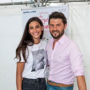 Tatiana Silva et Christophe Beaugrand au festival des Livres et des Artistes organisé par l'association "Lecture pour Tous" engagée dans la lutte contre l'illettrisme au Mail Branly à Paris le 3 juillet 2022. © Pierre Perusseau / Jack Tribeca / Bestimage
